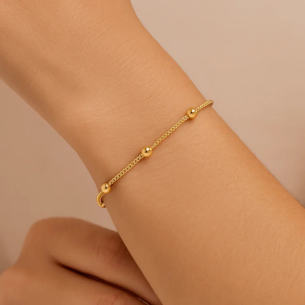 Pulseira Rommanel com Bolinhas de 4 mm em Ouro 18K – Design Delicado e Elegante