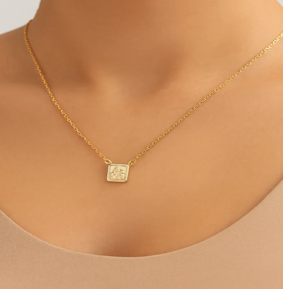 Escapulário Rommanel com Medalhas Coração de Jesus e N.S do Carmo em Corrente de Elo Cadeado – Elegância e Fé Premium - Joias Rommanel | YouBeauty - Brincos, Colares e Anéis com Frete Grátis