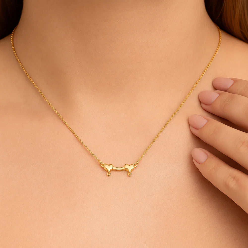 Pingente Rommanel com Dois Corações em Ouro 18K – Design Delicado e Compacto