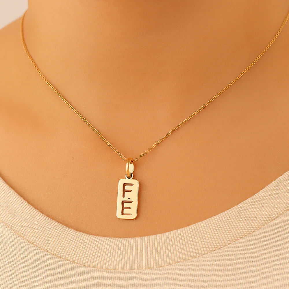 Pingente Retangular Rommanel com Palavra Fé Vazada em Ouro 18K – Design Delicado e Inspirador