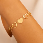 Pulseira Rommanel com 8 Corações Vazados e 1 Coração Fé – Design Delicado e Ajustável - Joias Rommanel | YouBeauty - Brincos, Colares e Anéis com Frete Grátis