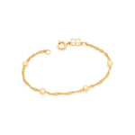 Pulseira Infantil Rommanel com Fio Cingapura Torcido e Bolas Ocas – Tamanho 14cm - Joias Rommanel | YouBeauty - Brincos, Colares e Anéis com Frete Grátis
